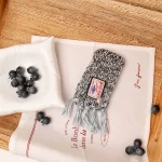 Wrap your furry friend in comfort and style with the Handcrafted Grey Knitted Pet Scarf. Featuring a classic grey tone with soft, high-quality yarn, this scarf is designed to keep your pet cozy during the colder months. The playful tassels and intricate knitting add a unique touch, making it a perfect accessory for winter walks, holiday gatherings, or photoshoots. Lightweight yet warm, this scarf offers an ideal blend of functionality and fashion. Whether paired with a pet coat or worn alone, it’s a versatile piece that enhances any look.