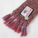 Elevate your pet’s winter wardrobe with the Rust-Red Handcrafted Knitted Pet Scarf. This scarf features a rich rust-red color accented with playful tassels and a vintage-style logo patch, exuding charm and sophistication. Handwoven from soft, high-quality yarn, it offers lightweight warmth and comfort, making it ideal for chilly outings or festive occasions. The intricate knitting and thoughtful details ensure your furry friend stays cozy and stylish throughout the season. Pair it with a coat or let it stand out as a statement accessory for pets who love a touch of luxury.