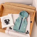 Upgrade your pet’s wardrobe with this trendy Zip-Up Sleeveless Pet Hoodie in refreshing aqua green. Designed with a zip closure for effortless dressing, this hoodie combines comfort with style. The lightweight, breathable fabric ensures your furry friend stays cozy yet unrestricted, while the hood adds a playful and functional touch. Perfect for walks, outdoor adventures, or lounging at home, this versatile hoodie is a must-have for pets who love to make a fashion statement. Ideal for both small and medium-sized pets, it’s a stylish addition to any collection.